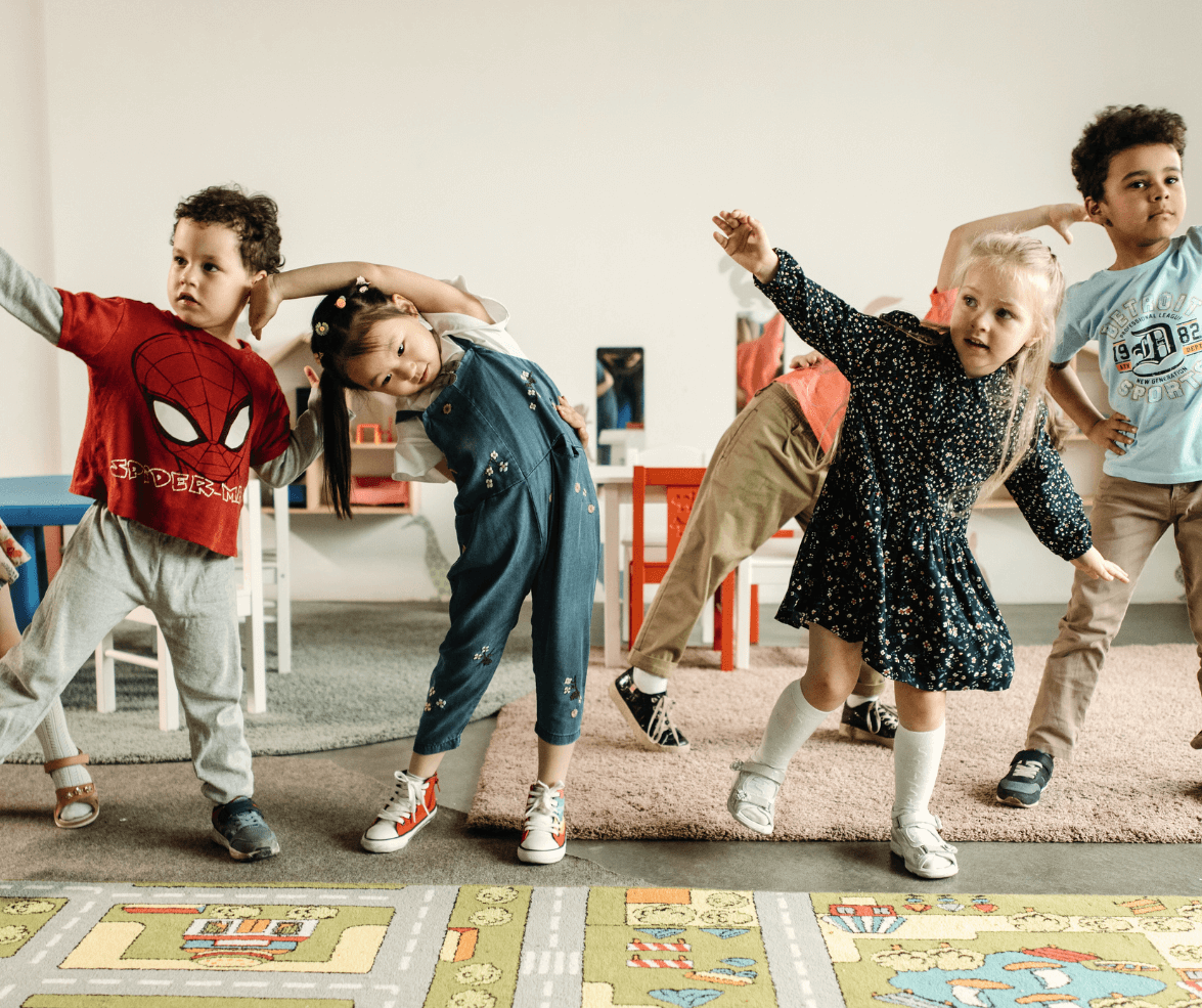 Children focusing and playing in a classroom