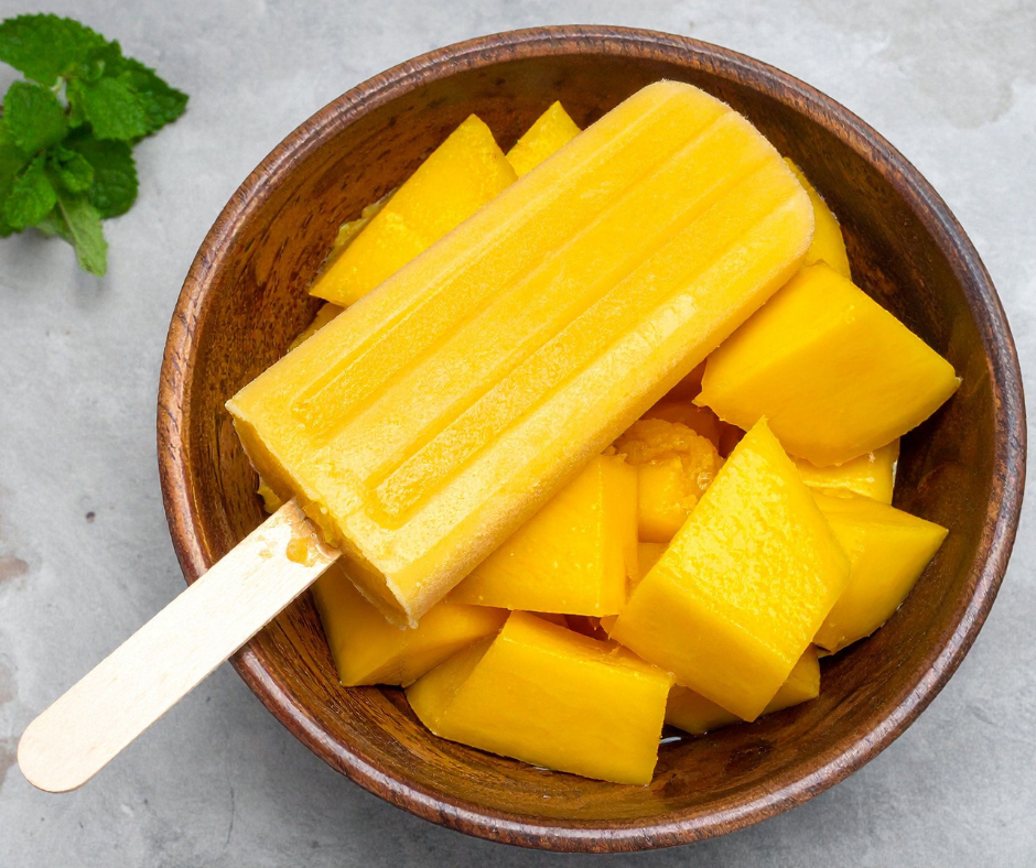 Tropical Popsicles with mango and pineapple and Barlean's multivitamin