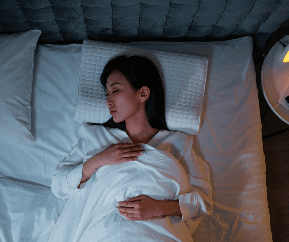 The Importance of Sleep for Everyday Wellness: a woman asleep in bed