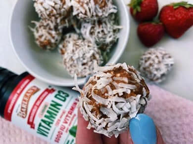 Barlean's Seriously Delicious Vitamin D3 and a bowl of strawberry energy balls.