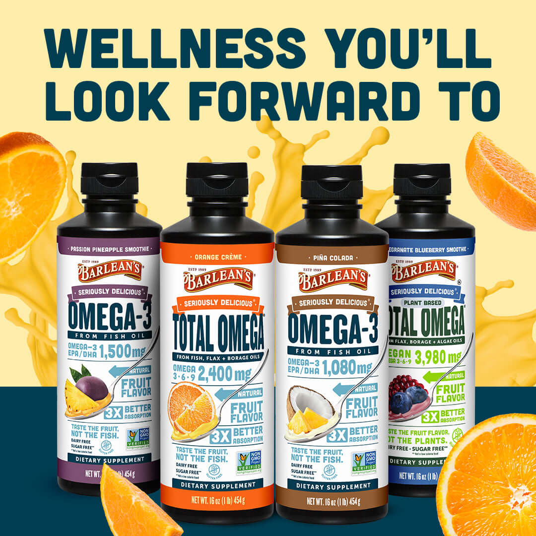 Four bottles of Barlean's Omega-3 supplements with Total Omega 3-6-9 Orange Crème in the center, featuring orange slices.