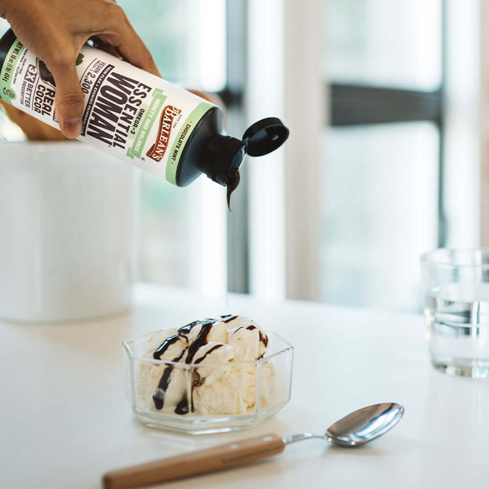 chocolate mint flavored women’s oil supplement drizzled over vanilla ice cream