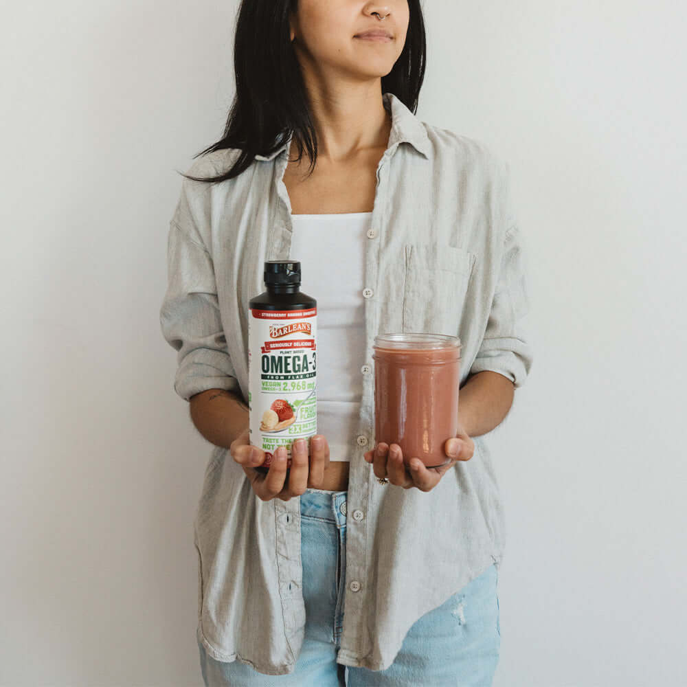 Creamy flax oil supplement featured in a glass