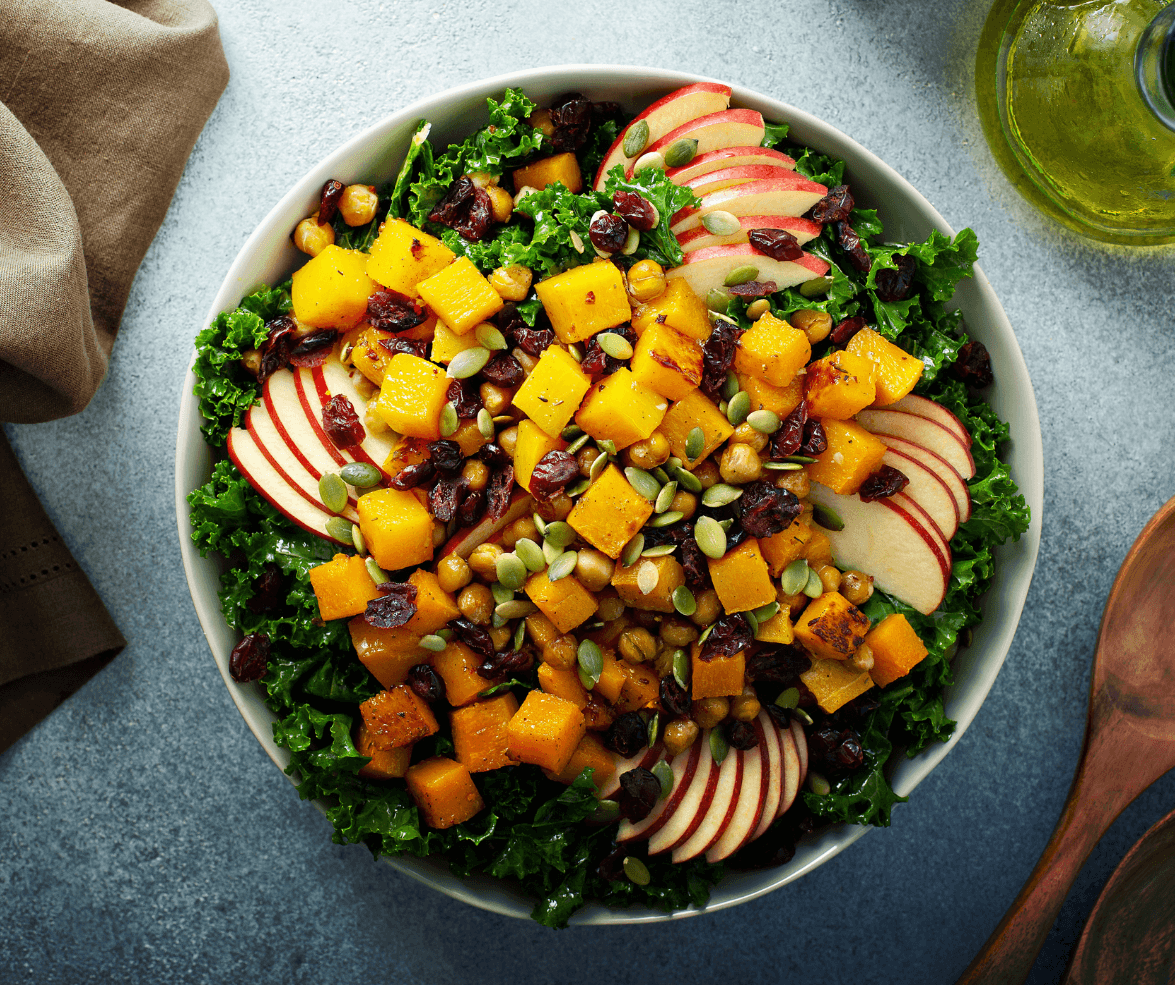 an Autumn Harvest Grain Bowl with Apple-Flax Dressing including Warm roasted squash. Crisp apple. Chewy grains. Tart cranberries. Crunchy pumpkin seeds.