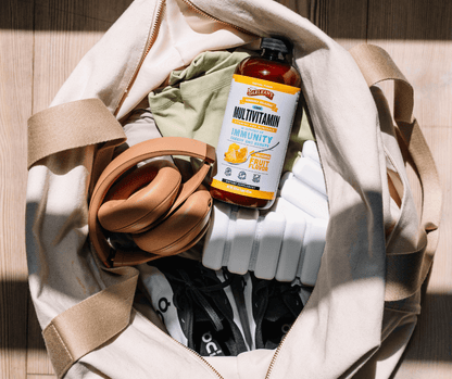Picture of Barlean's Tropical Liquid Multivitamin in a gym bag